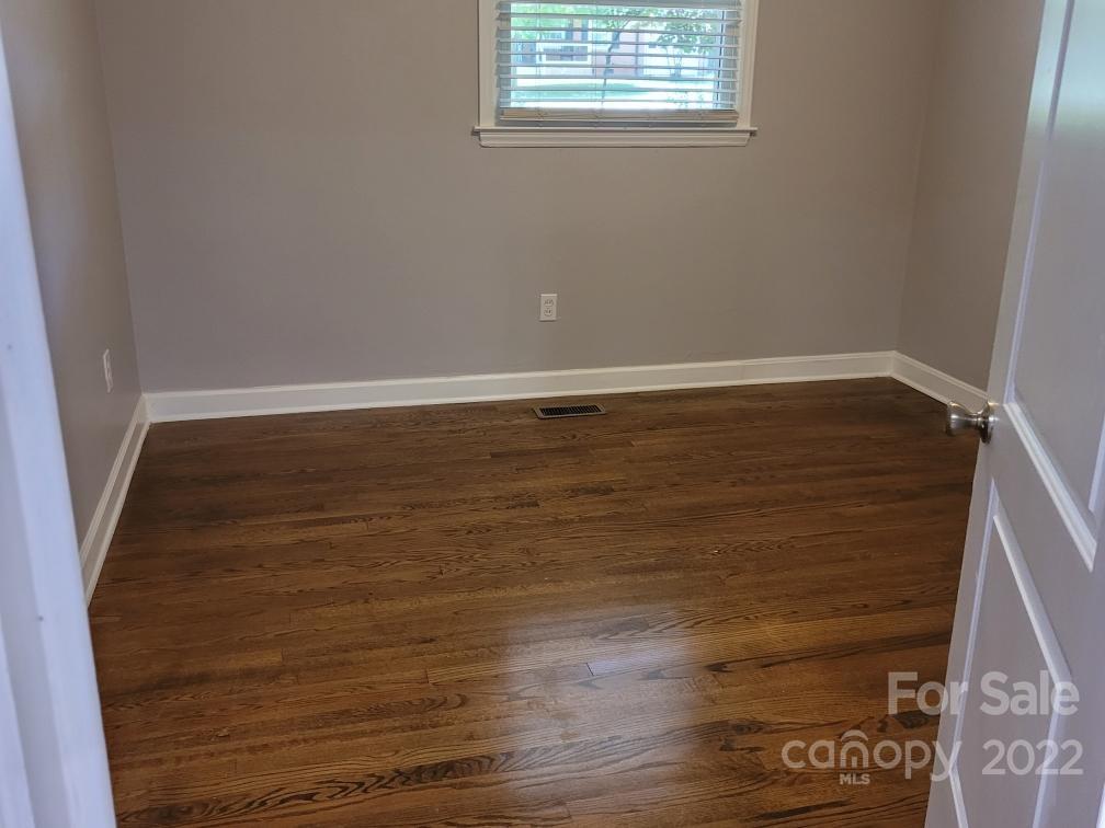 706 Fieldstone Road Mooresville, NC 28115 - Photo 11 of 11 a view of a room with wooden floor and a window