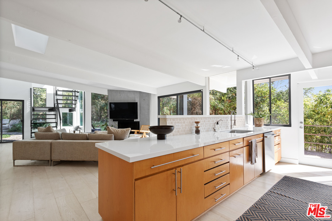 9015 Burroughs Road Los Angeles, CA 90046 - Photo 2 of 19 a room with sink attached with living room