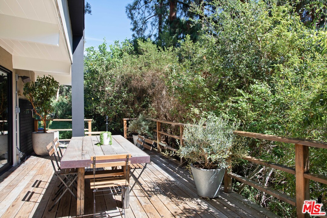 9015 Burroughs Road Los Angeles, CA 90046 - Photo 14 of 19 a view of a balcony with chairs