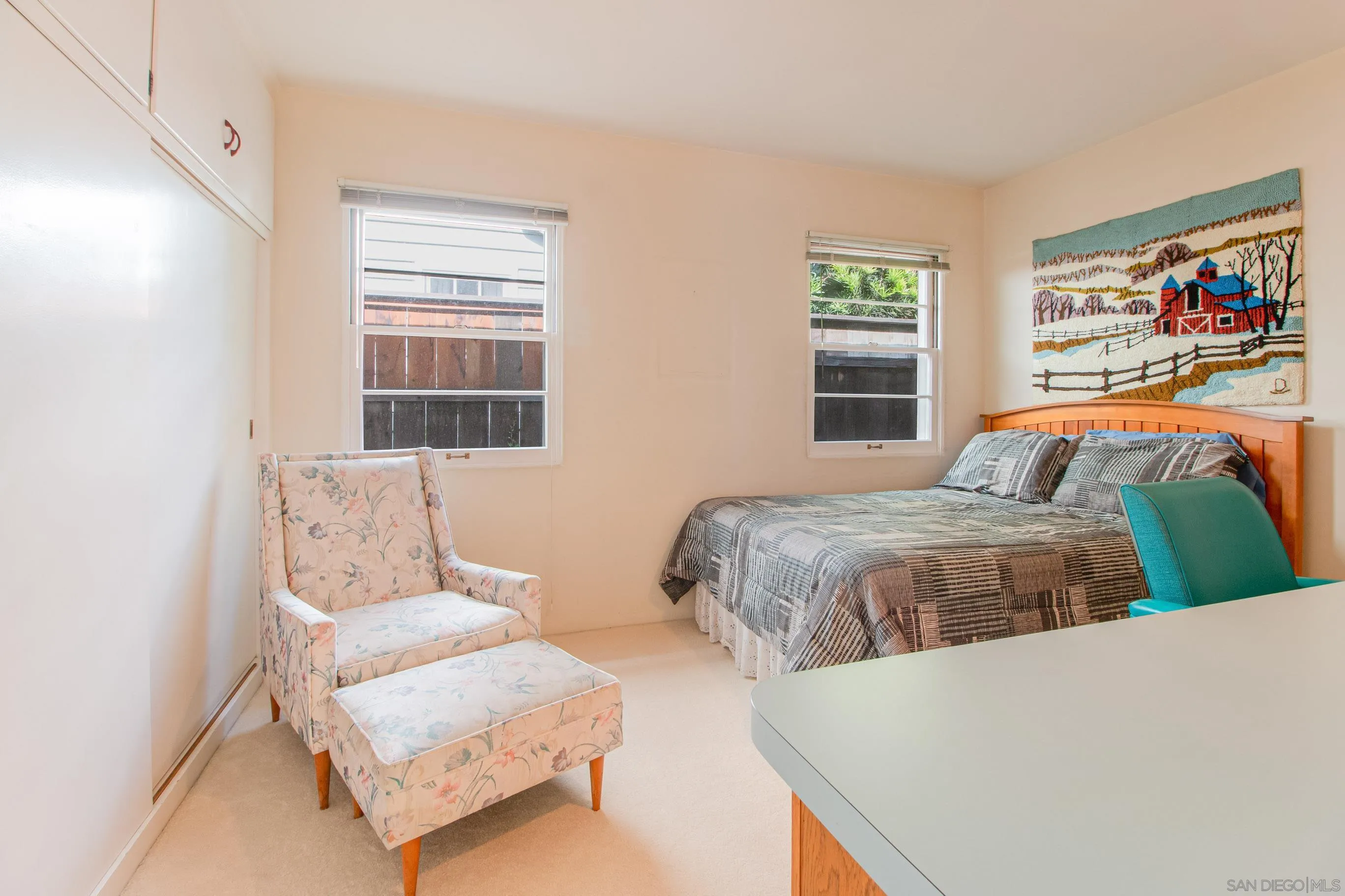 545 J Avenue Coronado, CA 92118 - Photo 16 of 26 a bedroom with a bed and a couch