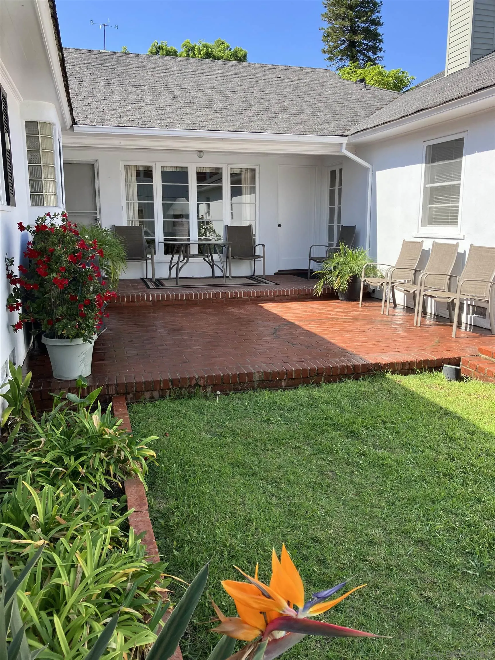 545 J Avenue Coronado, CA 92118 - Photo 20 of 26 a front view of house with yard and outdoor seating