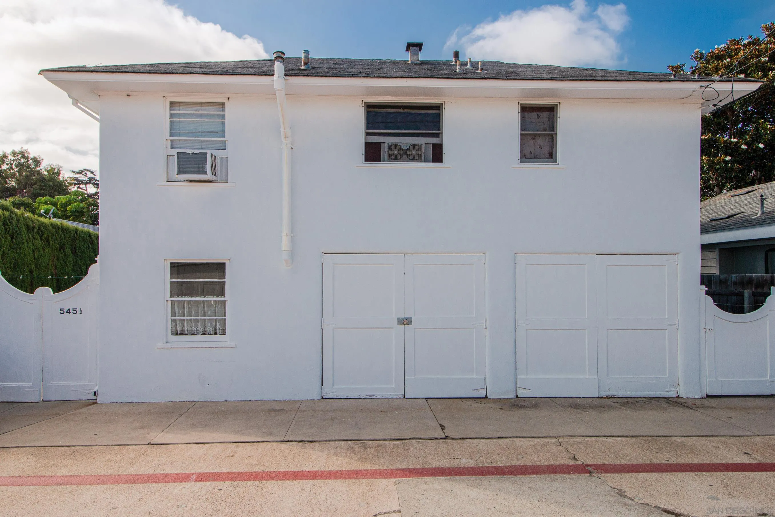 545 J Avenue Coronado, CA 92118 - Photo 25 of 26 a house that has a window in it
