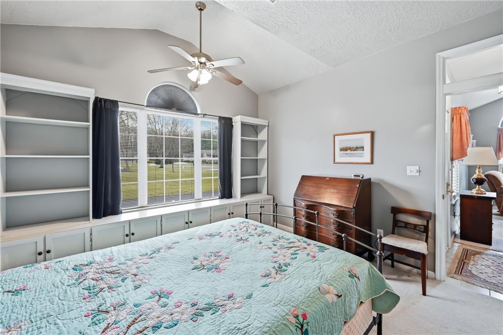 76 Stone Ridge Boulevard Hermitage, PA 16148 - Photo 23 of 34 a bedroom with a bed and wooden floor