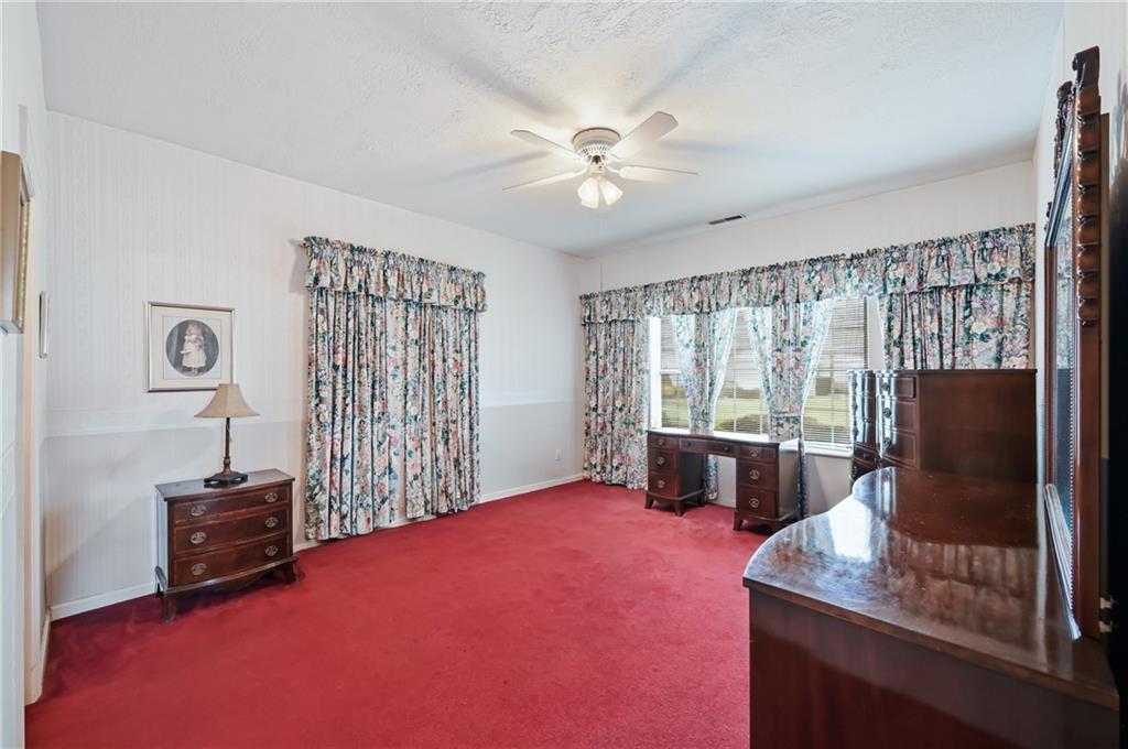 76 Stone Ridge Boulevard Hermitage, PA 16148 - Photo 26 of 33 a bedroom with furniture and a window