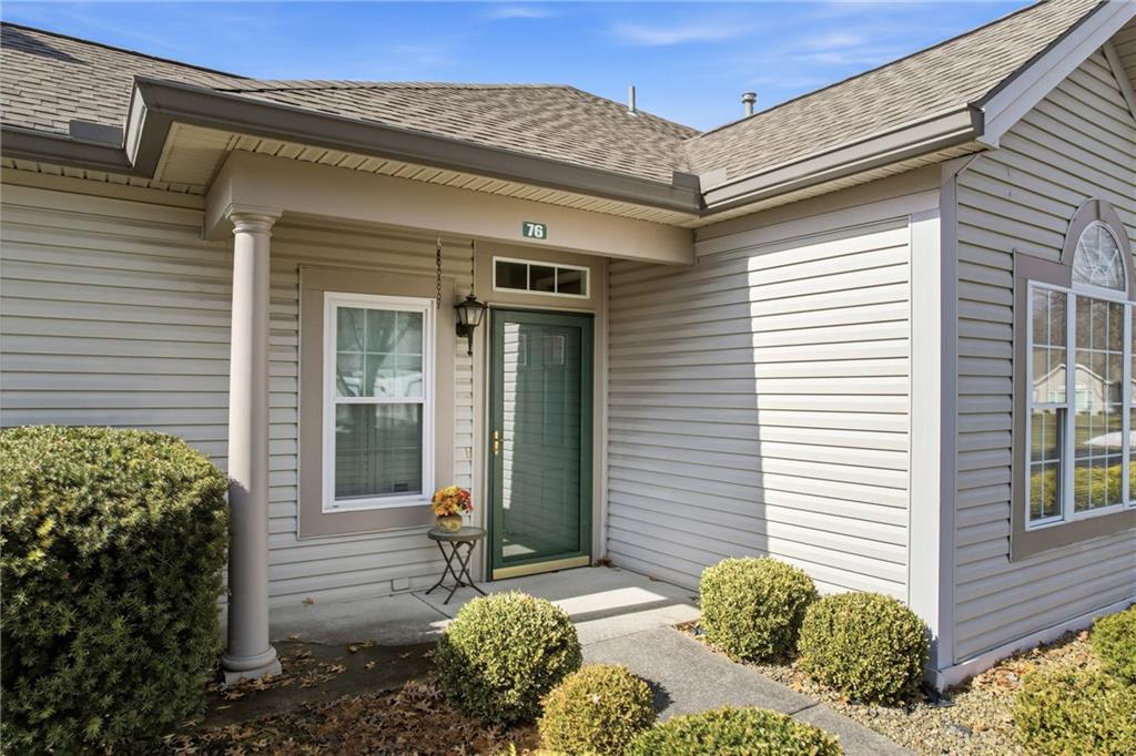 76 Stone Ridge Boulevard Hermitage, PA 16148 - Photo 8 of 34 a front view of a house with a yard
