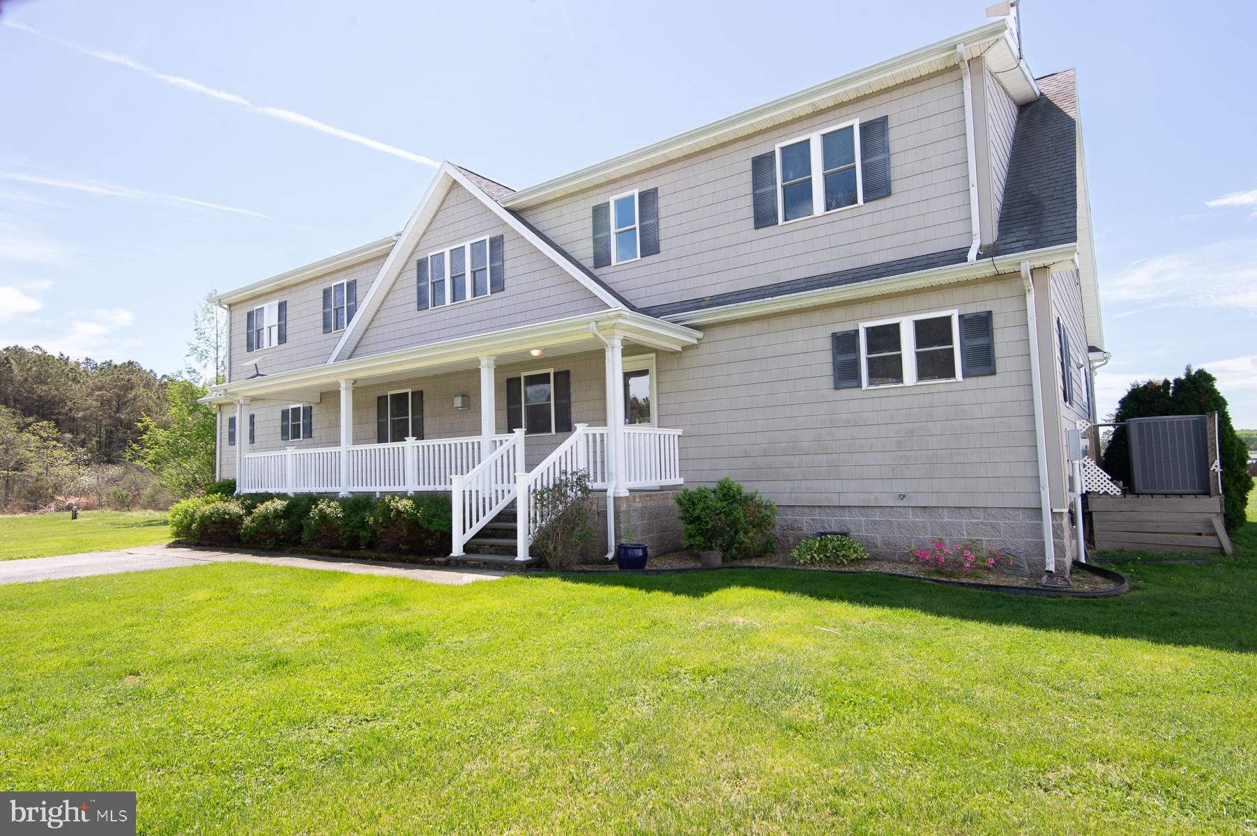 5704 Ross Neck Road Cambridge, MD 21613 - Photo 30 of 98 Charming home with lush green surroundings.