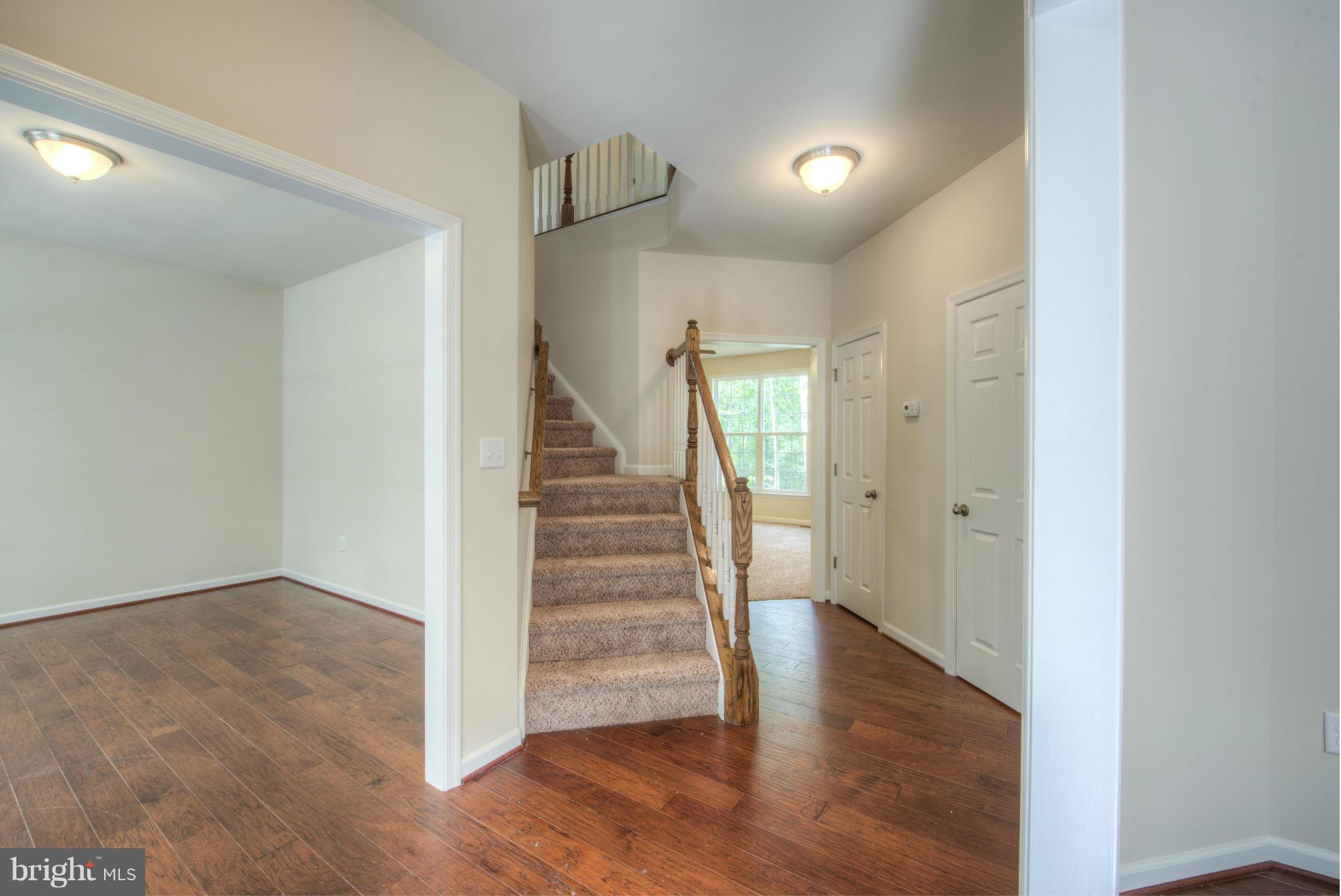 15040 Oakland Road Reva, VA 22735 - Photo 3 of 26 a view of a hallway with wooden floor and entryway