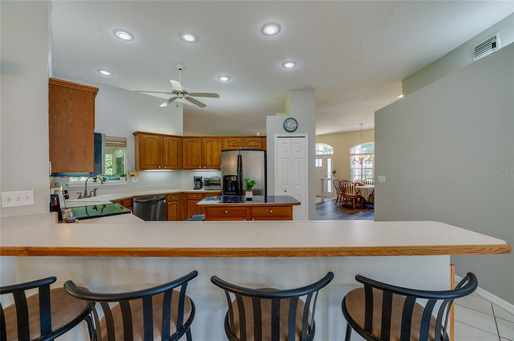 27 Foxhunter Flat Ormond Beach, FL 32174 - Photo 13 of 47 a dining room with furniture and wooden floor