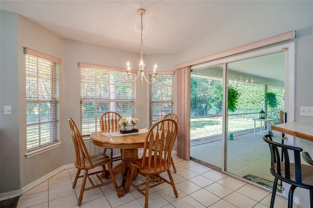 27 Foxhunter Flat Ormond Beach, FL 32174 - Photo 15 of 47 a view of a dining room with furniture window and outside view