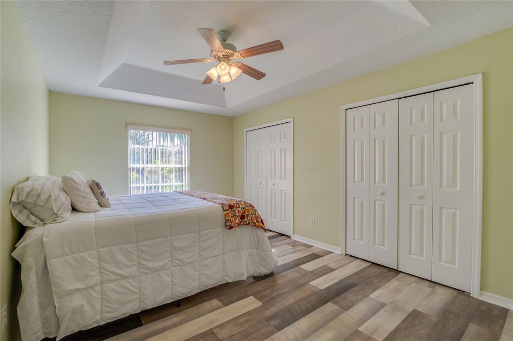 27 Foxhunter Flat Ormond Beach, FL 32174 - Photo 22 of 47 a bedroom with a bed and window