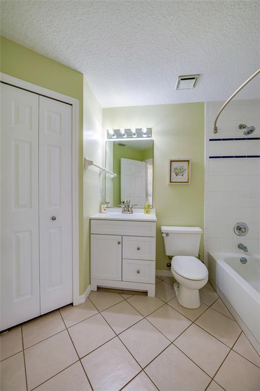 27 Foxhunter Flat Ormond Beach, FL 32174 - Photo 23 of 47 a bathroom with a double vanity sink a mirror and a toilet