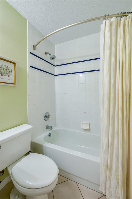 27 Foxhunter Flat Ormond Beach, FL 32174 - Photo 24 of 47 a white toilet and shower sitting next to a white tub