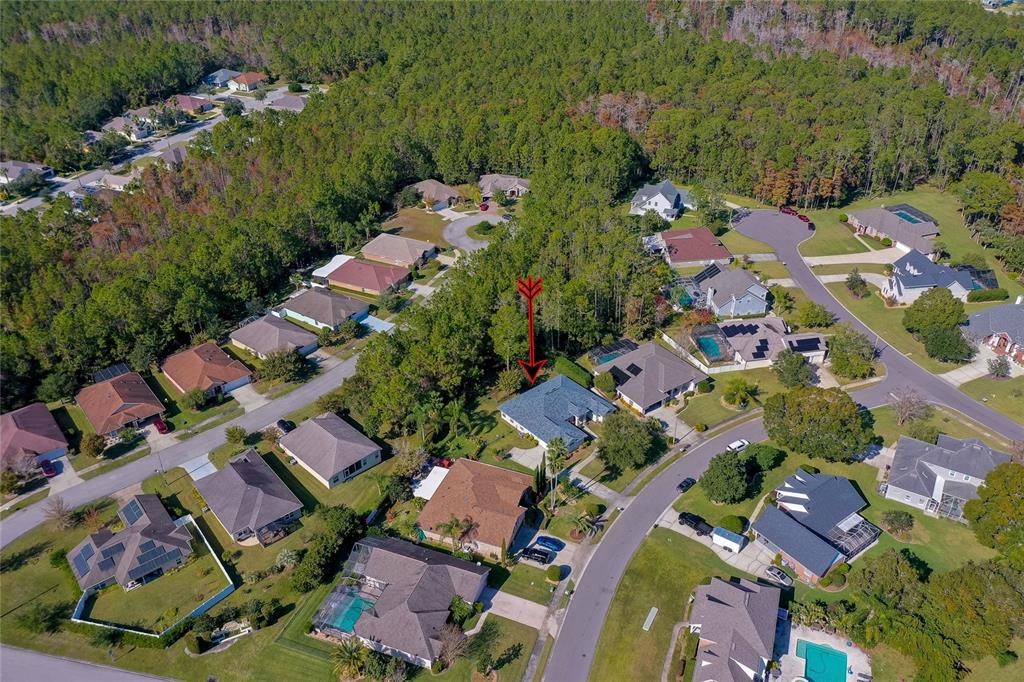 27 Foxhunter Flat Ormond Beach, FL 32174 - Photo 43 of 47 an aerial view of residential houses with outdoor space