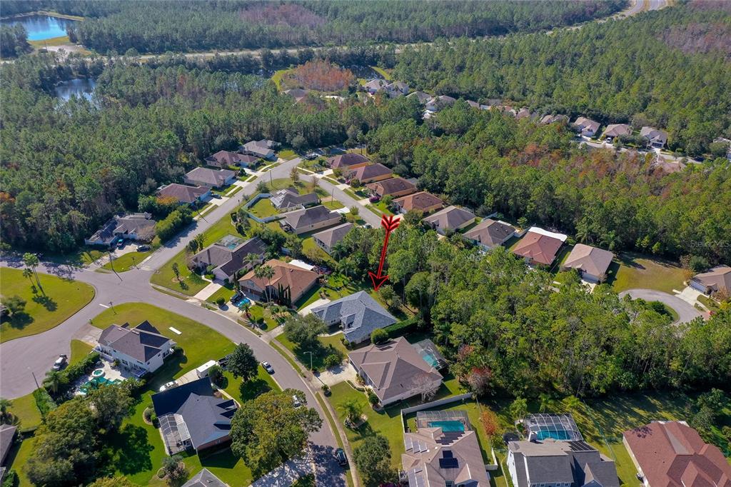27 Foxhunter Flat Ormond Beach, FL 32174 - Photo 44 of 47 an aerial view of lake residential house with outdoor space and swimming pool