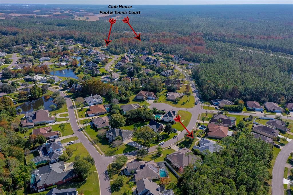 27 Foxhunter Flat Ormond Beach, FL 32174 - Photo 45 of 47 an aerial view of a houses with a yard