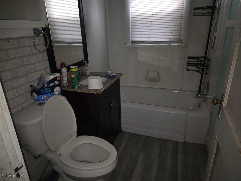 3125 Dover Road Wooster, OH 44691 - Photo 8 of 17 Full bath with dark wood finished floors and vanity