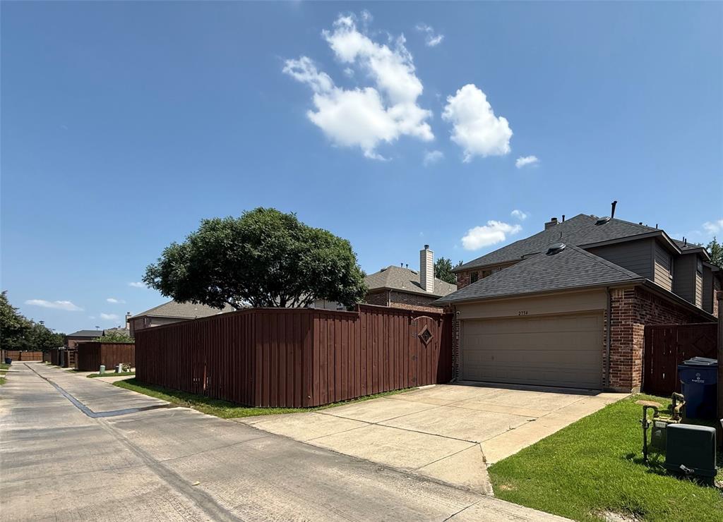 2754 Ridge View Road Frisco, TX 75034 - Photo 34 of 34 a view of a house in front of a yard