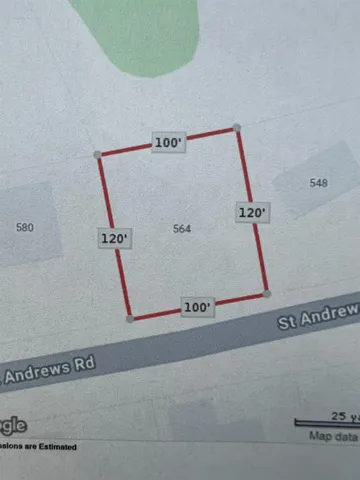 a utility room with dryer and white door