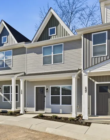 a view of kitchen with wooden floor