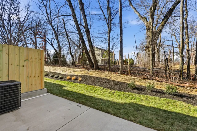 a view of a street with a park