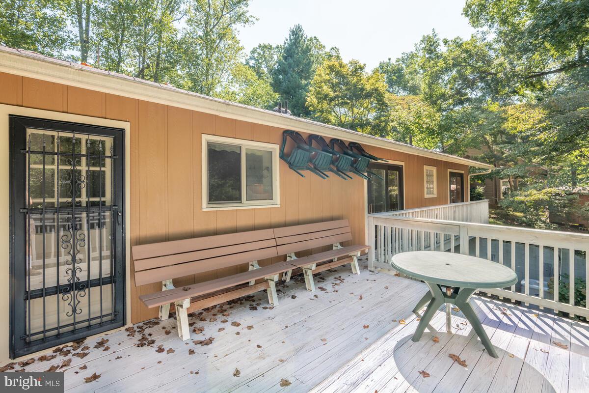 2645 Aspen Road Port Republic, MD 20676 - Photo 22 of 51 a view of a patio with a table and chairs