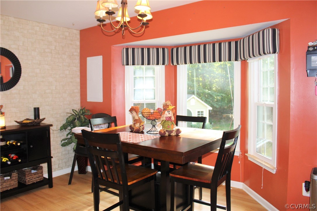 10340 North Donegal Road Chesterfield, VA 23832 - Photo 14 of 49 a view of a dining room with furniture window and outside view