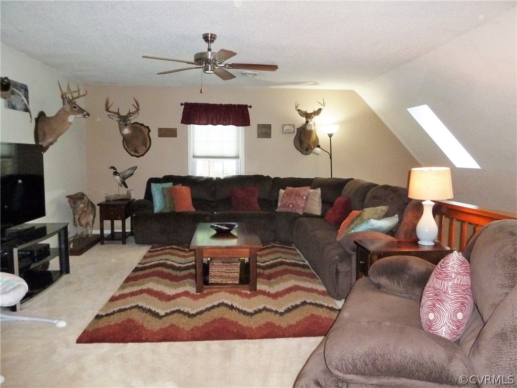 10340 North Donegal Road Chesterfield, VA 23832 - Photo 26 of 49 a living room with furniture and a window