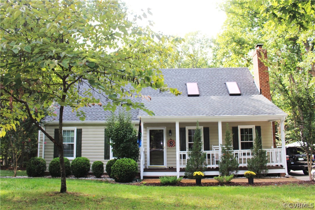 10340 North Donegal Road Chesterfield, VA 23832 - Photo 3 of 49 a front view of house with yard patio and green space