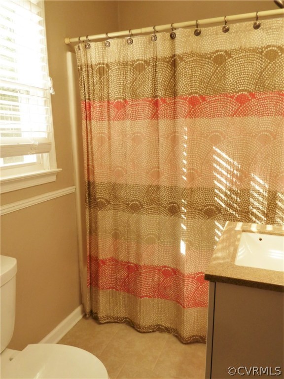 10340 North Donegal Road Chesterfield, VA 23832 - Photo 31 of 49 a bathroom with a shower curtain