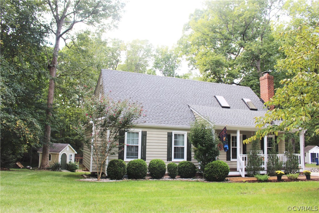 10340 North Donegal Road Chesterfield, VA 23832 - Photo 4 of 49 a view of a house with garden and yard