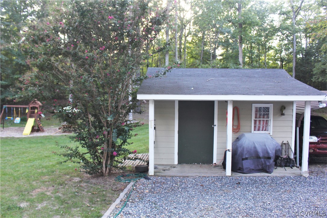 10340 North Donegal Road Chesterfield, VA 23832 - Photo 46 of 49 a view of a house with a yard and large tree