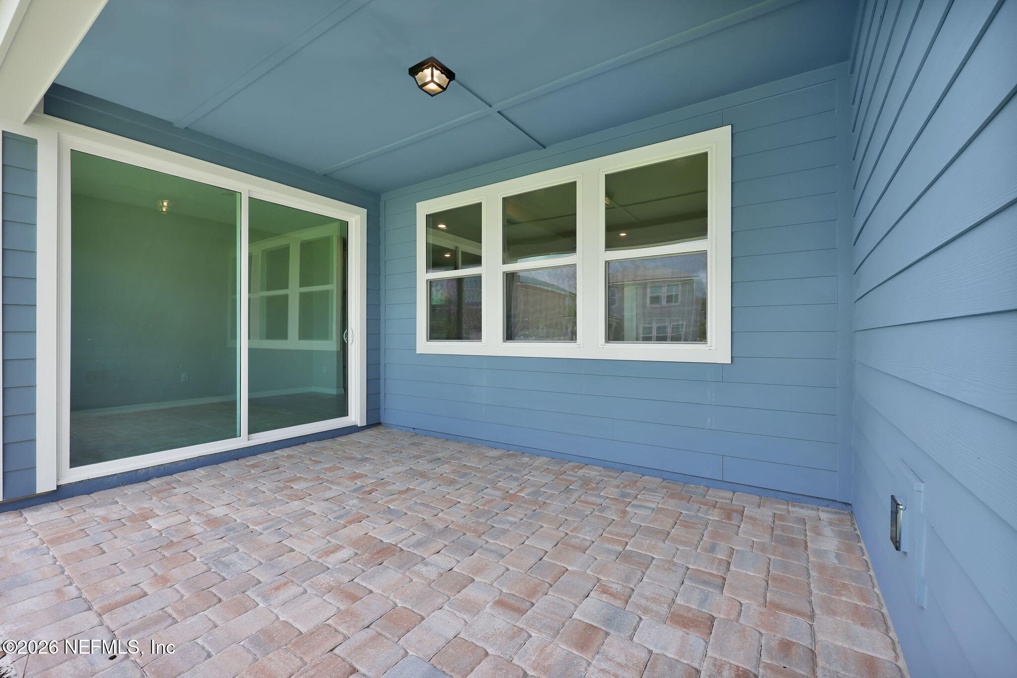 368 Pine Lilly Loop Yulee, FL 32097 - Photo 28 of 29 Symphony Covered Lanai