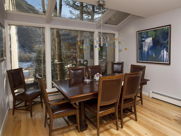 2570 Bald Mountain Road, Unit E Vail, CO 81657 - Photo 11 of 25 a view of a dining room with furniture window and outside view