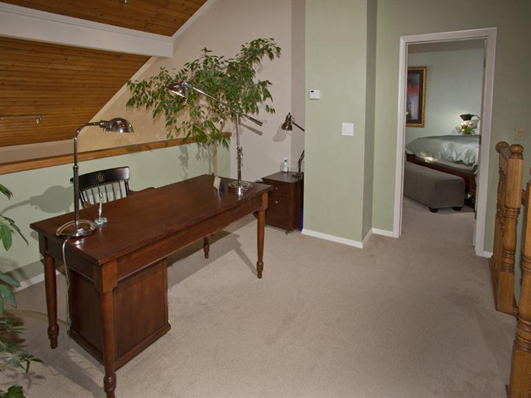 2570 Bald Mountain Road, Unit E Vail, CO 81657 - Photo 16 of 25 a living room with furniture and a potted plant