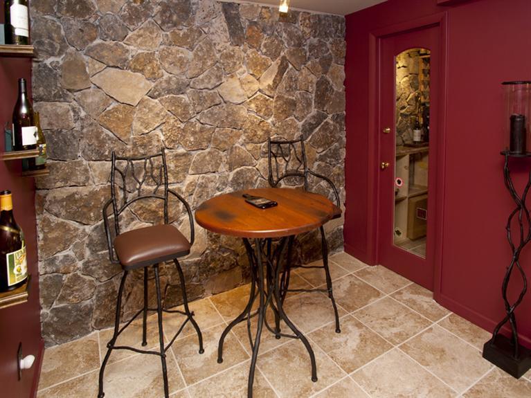 2570 Bald Mountain Road, Unit E Vail, CO 81657 - Photo 20 of 25 a table and chairs in a flower room