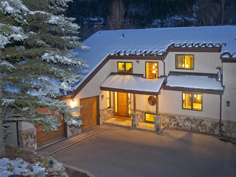 2570 Bald Mountain Road, Unit E Vail, CO 81657 - Photo 2 of 25 a front view of a house with a yard