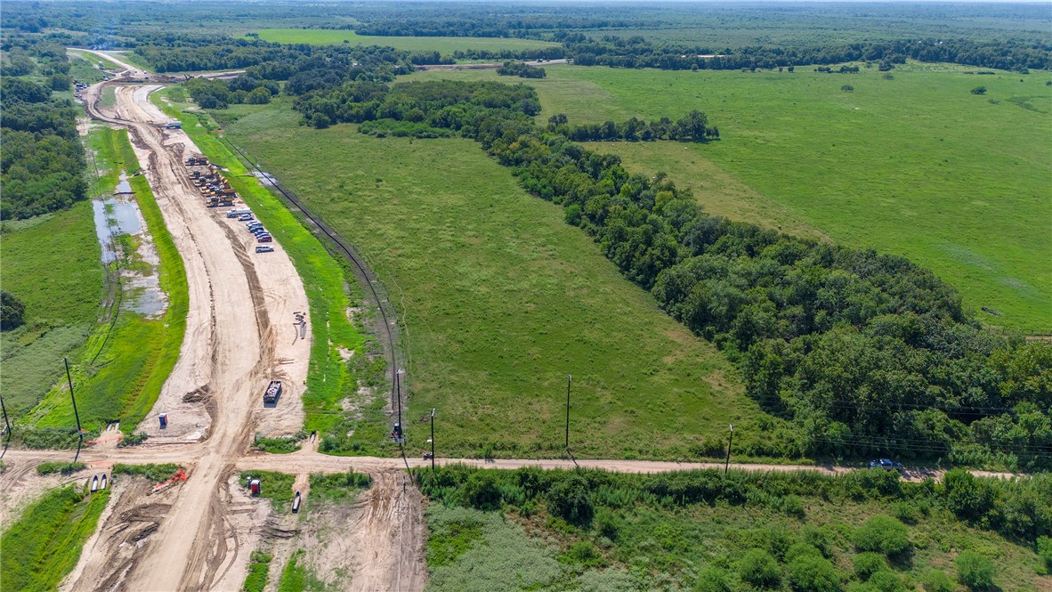 0 Black Bayou Road Bloomington, TX 77951 - Photo 21 of 39 an aerial view of a golf course with a lake view
