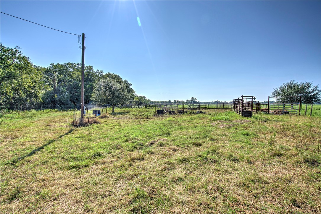 0 Black Bayou Road Bloomington, TX 77951 - Photo 23 of 39 a backyard of a house with lots of green space