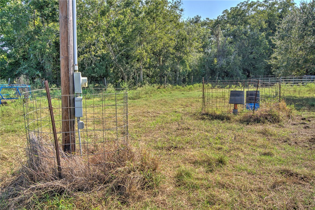 0 Black Bayou Road Bloomington, TX 77951 - Photo 24 of 39 a view of a lake with a house in the background