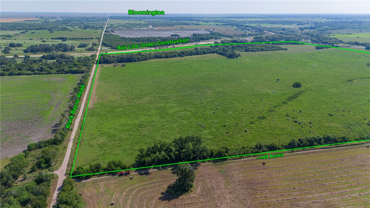 0 Black Bayou Road Bloomington, TX 77951 - Photo 6 of 39 a view of a backyard with a garden