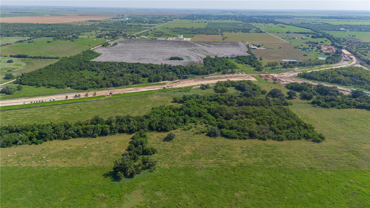 0 Black Bayou Road Bloomington, TX 77951 - Photo 9 of 39 an aerial view of residential houses with outdoor space and trees