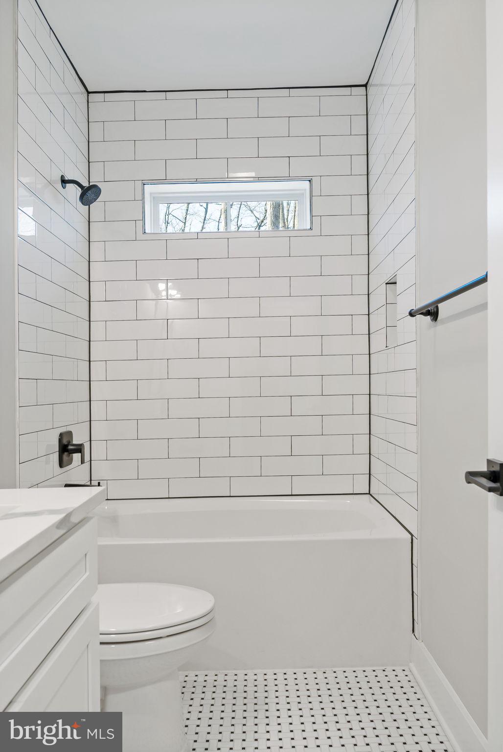 321 Mistletoe Lane Shepherdstown, WV 25443 - Photo 25 of 57 a bathroom with a bathtub and a shower