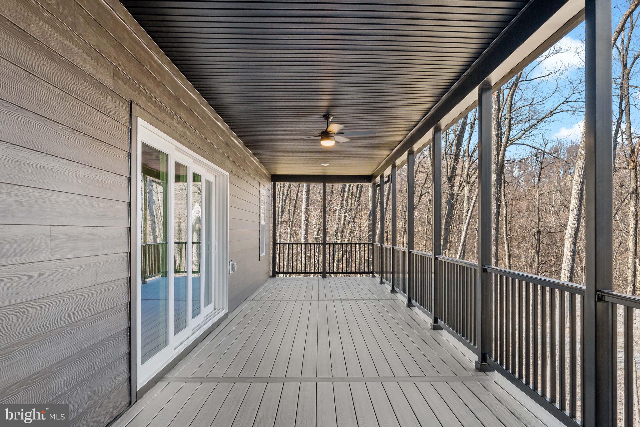321 Mistletoe Lane Shepherdstown, WV 25443 - Photo 5 of 57 a view of a balcony with wooden floor