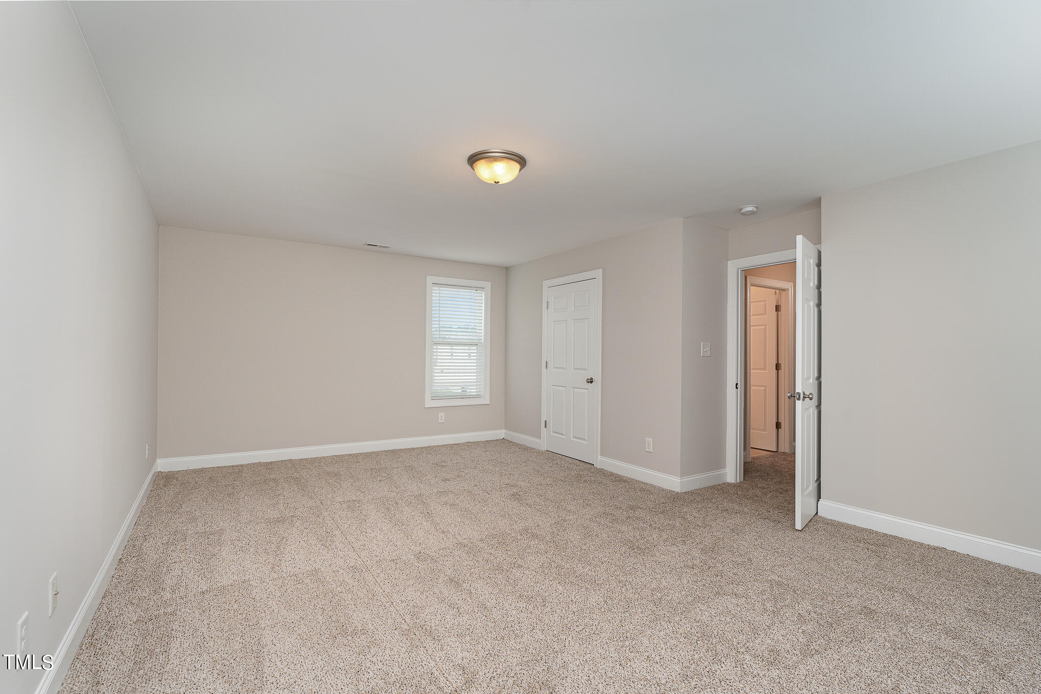 117 Celestial Drive Garner, NC 27529 - Photo 11 of 15 an empty room with windows and closet
