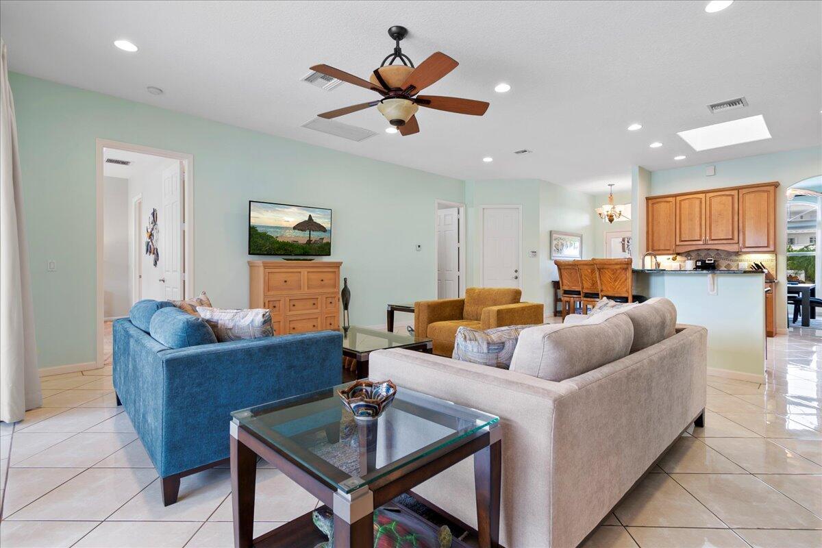 72 Waterway Road Jupiter, FL 33469 - Photo 12 of 57 a living room with furniture and kitchen view