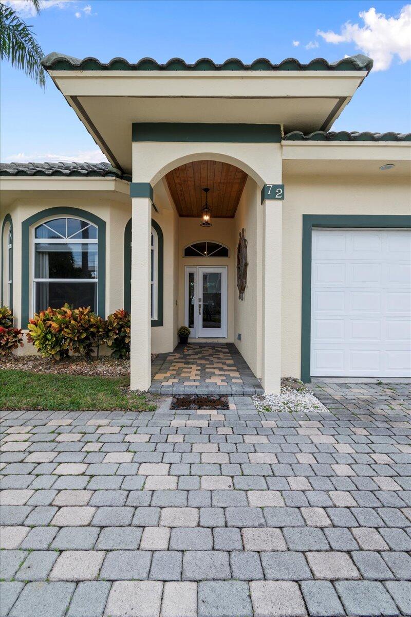 72 Waterway Road Jupiter, FL 33469 - Photo 42 of 57 a view of a house with a small space