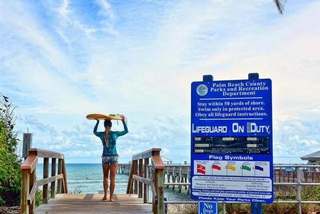 a view of a backyard with sitting area
