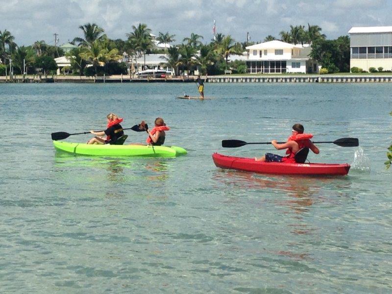 72 Waterway Road Jupiter, FL 33469 - Photo 50 of 57 a small pool is sitting in the middle of a lake