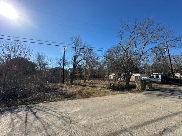 a view of a patio with a yard