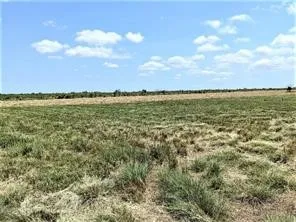 a view of an ocean and mountain